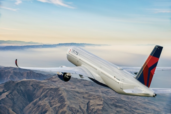 A350 flying over mountains