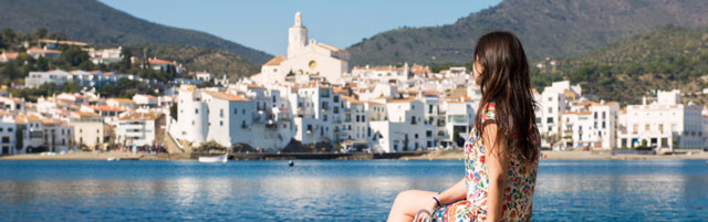 Woman sitting on dock