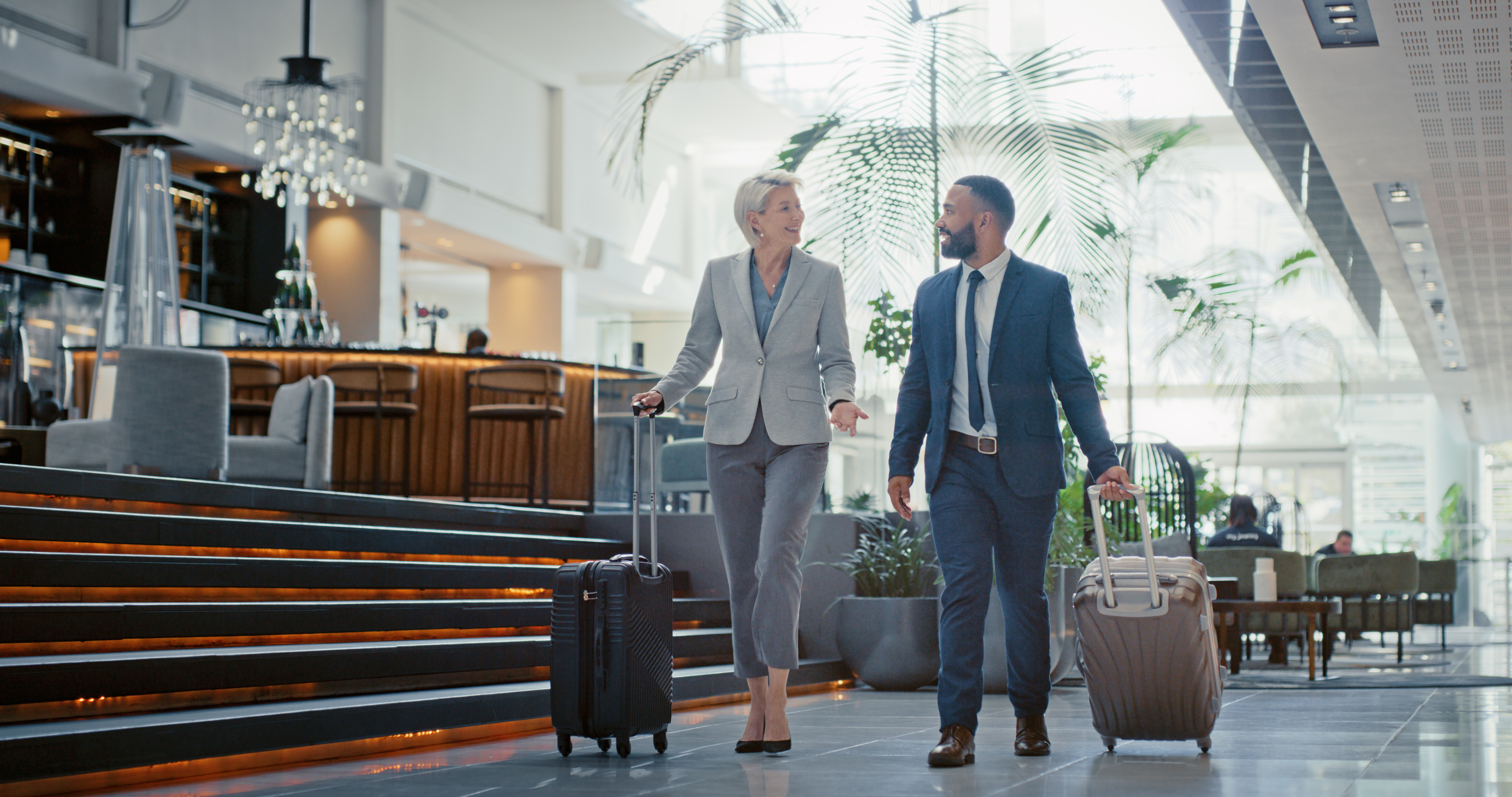 Customers walking through airport terminal