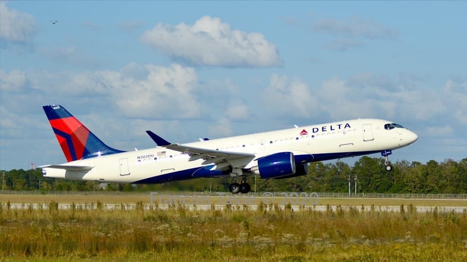 Delta Airbus A220-300 aircraft taking off Delta Airbus A220-300 aircraft taking off